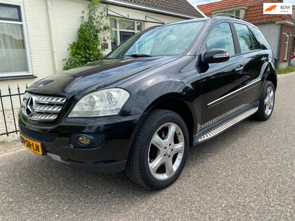 Mercedes-Benz M-klasse 350Aut,Trekhaak,Xenon,NAP, Auto's, Automaat, Gebruikt, Zwart, Origineel Nederlands