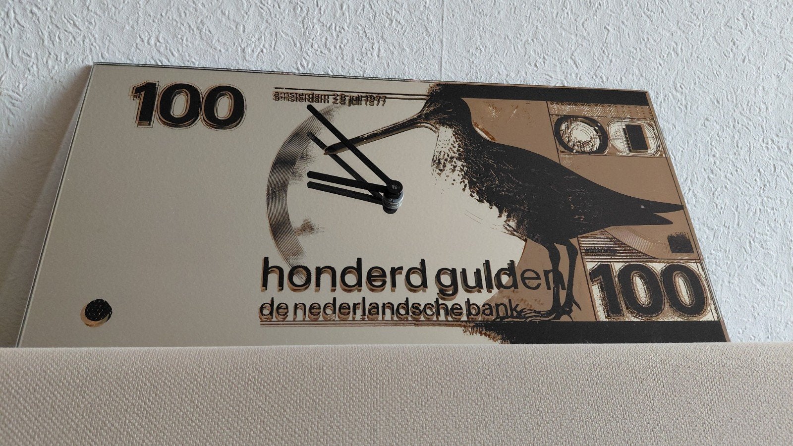Spiegel klok 100 Gulden, Ophalen