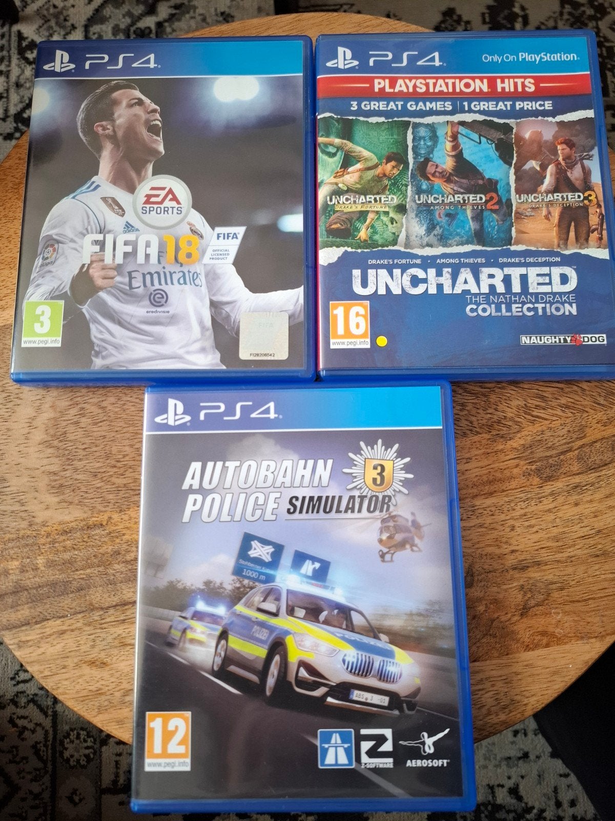 PS4 Games: FIFA 18, Uncharted Collection, Autobahn Police 3, Ophalen, Zo goed als nieuw