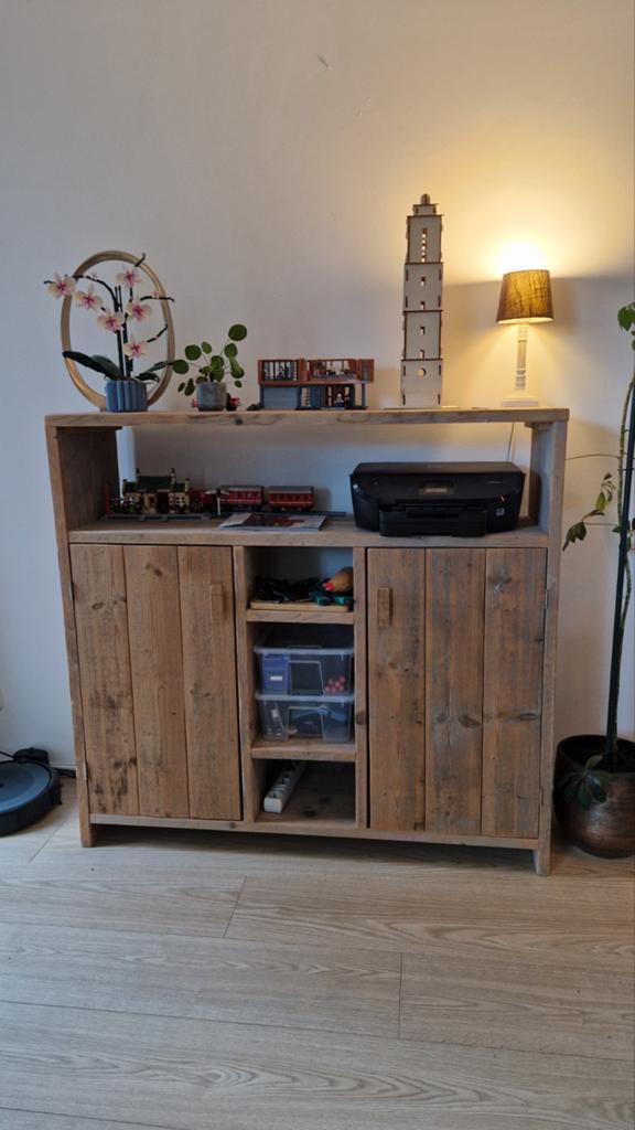 Steigerhouten dressoir, Ophalen