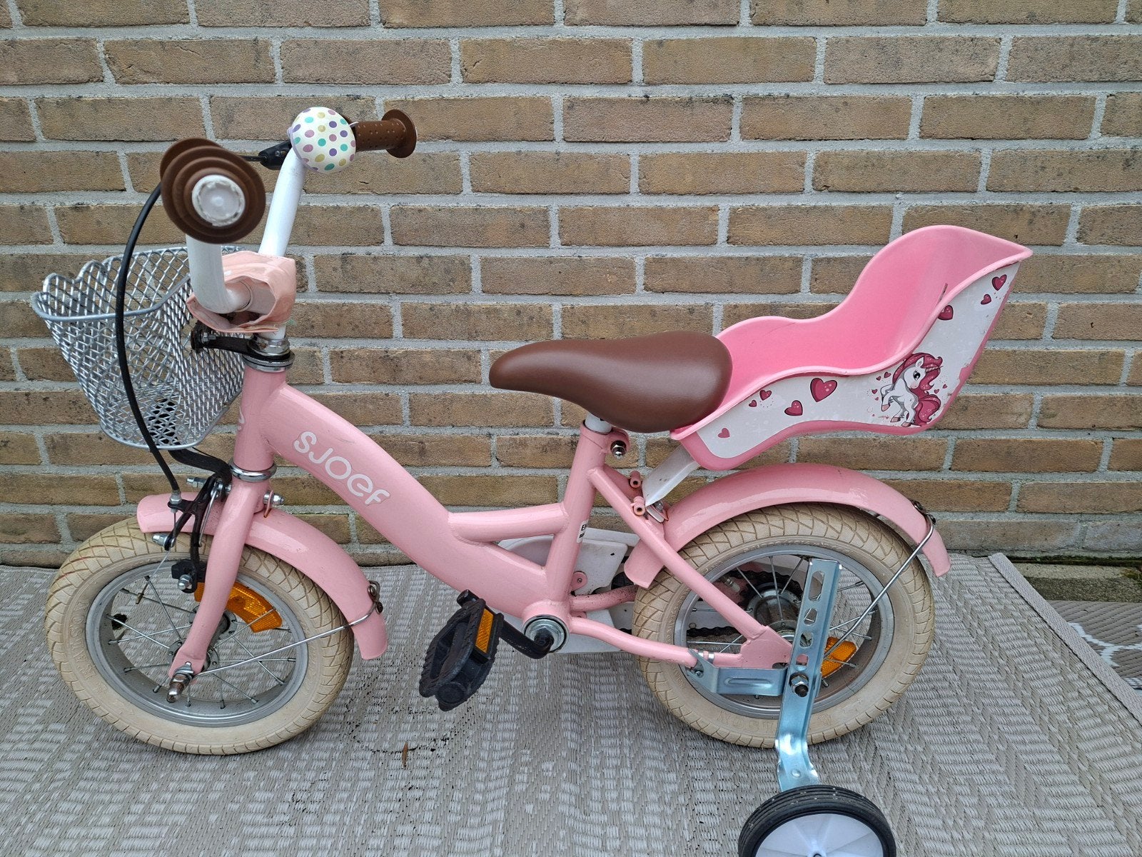 Roze Sjoef kinderfiets met zijwieltjes en poppenzitje, Ophalen, Zijwieltjes, Gebruikt, Velgrem