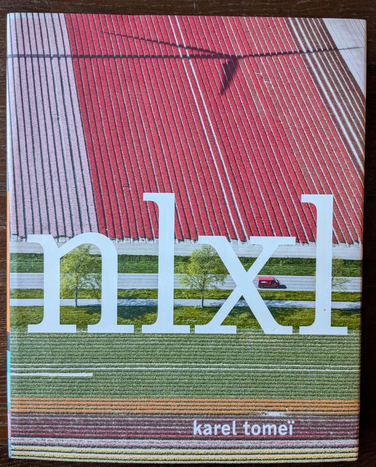 NLXL - Karel Tomeï - Luchtfotografie Nederland, Ophalen of Verzenden, Zo goed als nieuw, Fotografie algemeen, Karel Tomeï