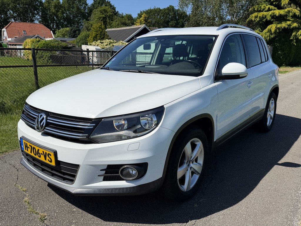 Volkswagen Tiguan 1.4 TSI Sport&Style NAVI/ECC/CRUISE/STOELV, Voorwielaandrijving, Euro 5, 15 km/l, Gebruikt