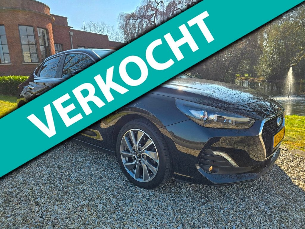Hyundai I30 Fastback 1.4 T-GDI Premium NAVI/airco/TREKHAAK, Auto's, Hyundai, Bedrijf, Te koop, i30, ABS, Achteruitrijcamera, Airbags