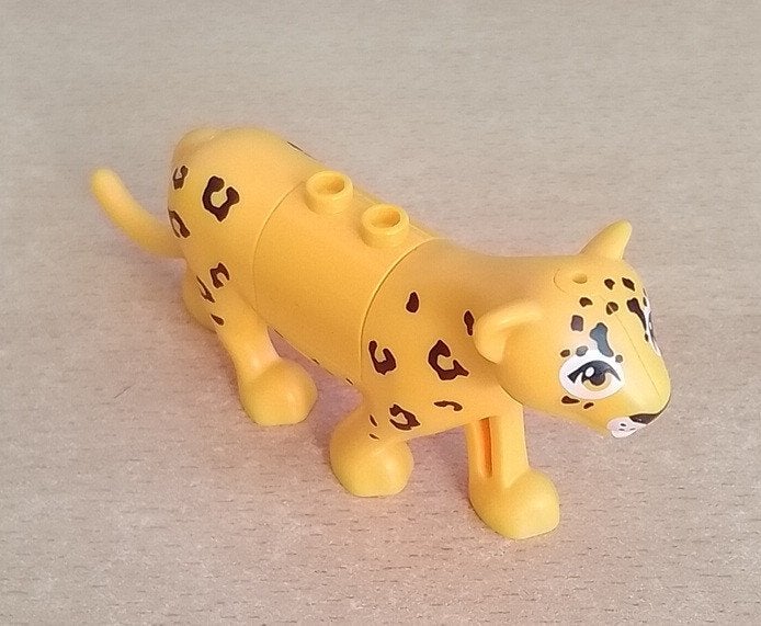 Lego jaguar 107092 met rugstuk, Kinderen en Baby's, Gebruikt, Overige thema's, Lego, Ophalen of Verzenden