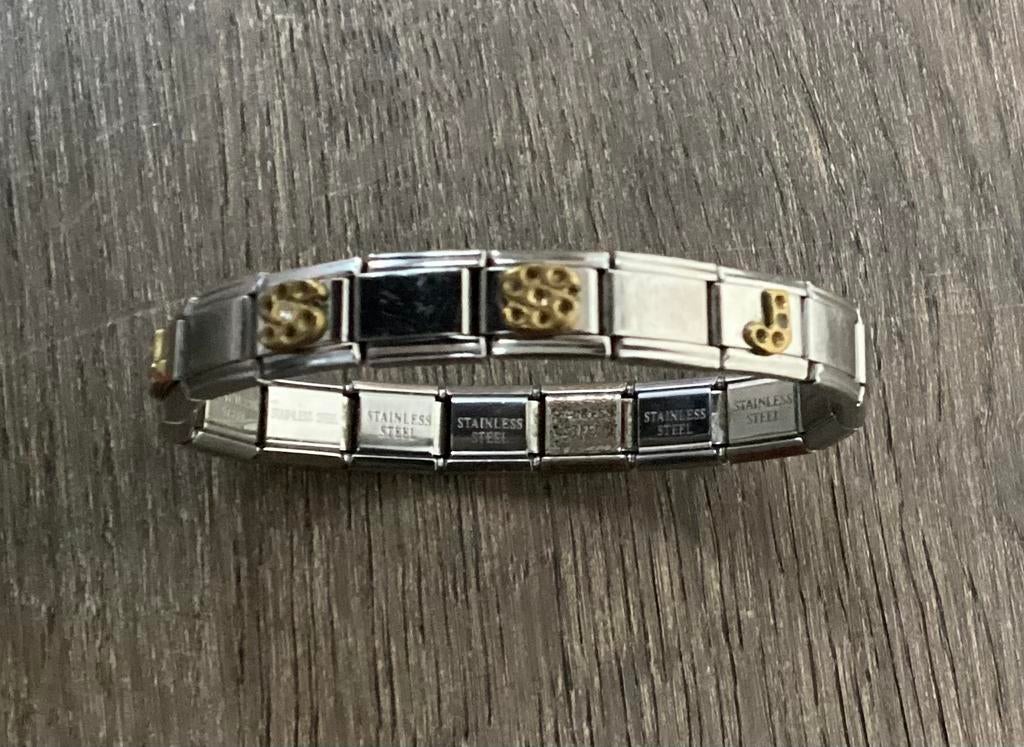 Armband in Zoppini-stijl RVS met bedels elastisch, Gebruikt, Staal, Ophalen of Verzenden, Met bedels of kralen