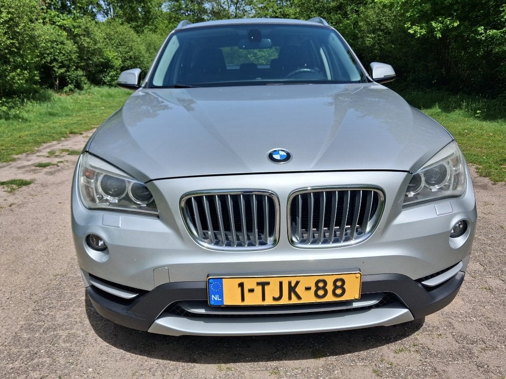 BMW X1 2.0 Sdrive 20I AUT 2014 Grijs, Auto's, BMW, 1800 kg, Zwart, 4 cilinders, Leder en Stof