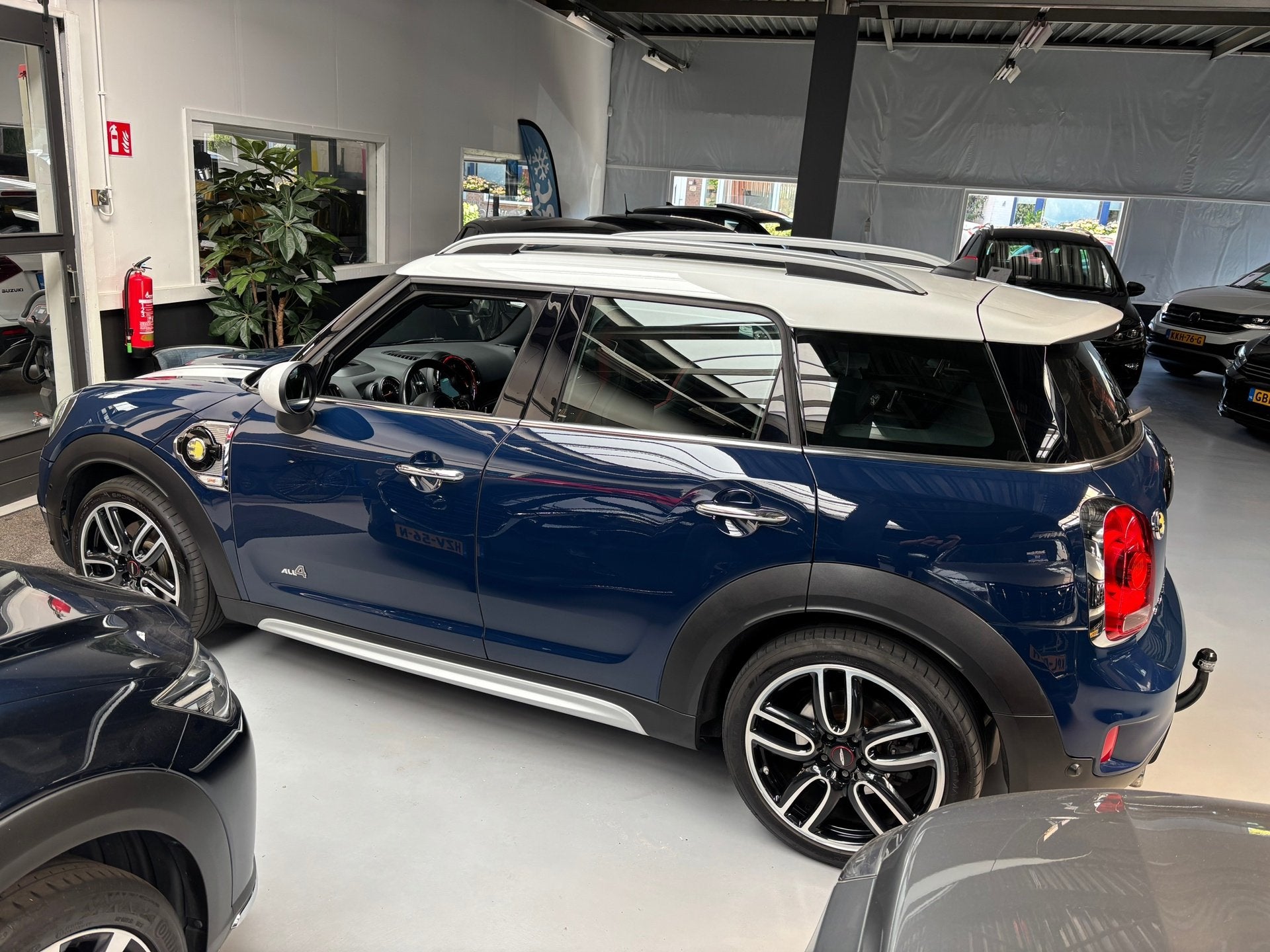 Mini Countryman 1.5 Cooper S E ALL4 John Works / Camera / Pa, Auto's, Mini, 136 pk, Gebruikt, Met garantie (alle), Blauw
