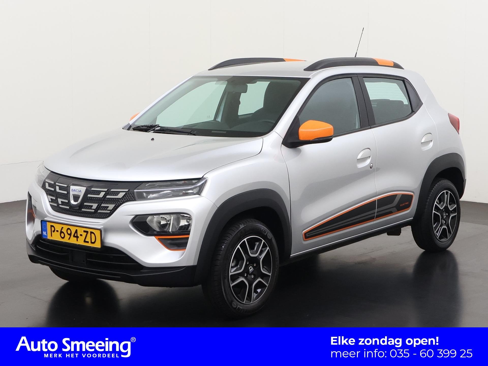 Dacia Spring Comfort Plus 27 kWh (Orange Pack) | SOH 91% | C, Auto's, 12 maanden, Parkeercamera, Gebruikt, 4 stoelen