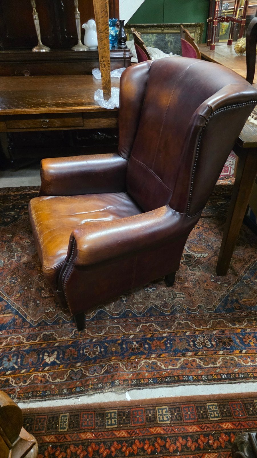 Lederen oorfauteuil, Ophalen