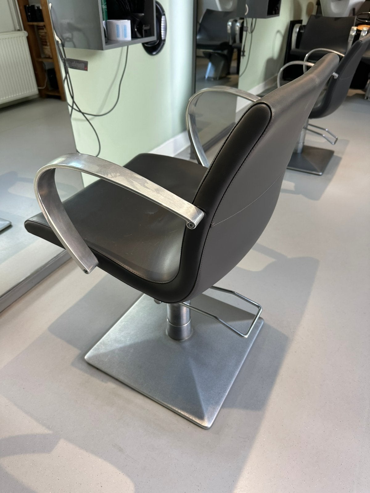 Kappersstoelen en kappersfietsen