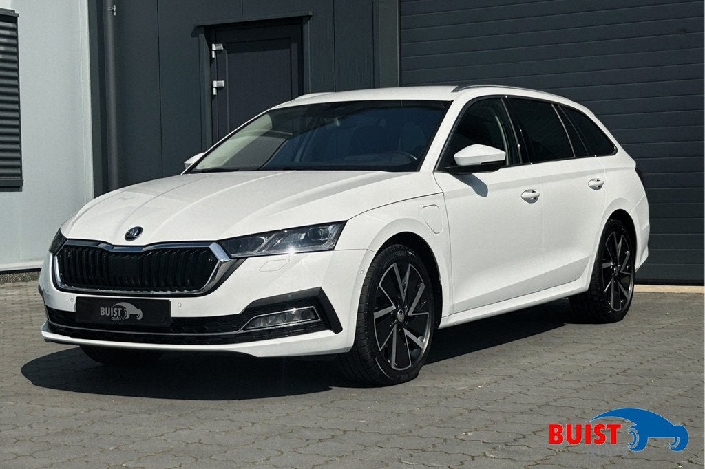 Skoda Octavia Combi 1.4 TSI iV PHEV Style 18" HUD LED ACC AD, Gebruikt, Met garantie (alle), Leder en Stof, Wit