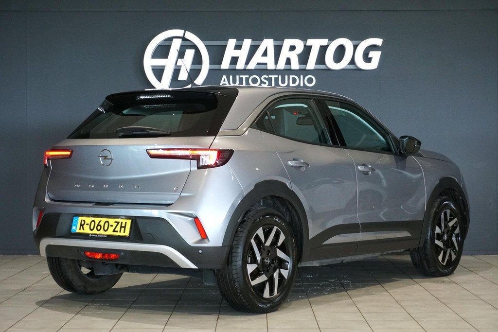 Opel Mokka-e Edition 50-kWh + CAMERA / LED / APPLE CARPLAY, Auto's, Opel, Parkeersensor, 1498 kg, SUV of Terreinwagen, Te koop