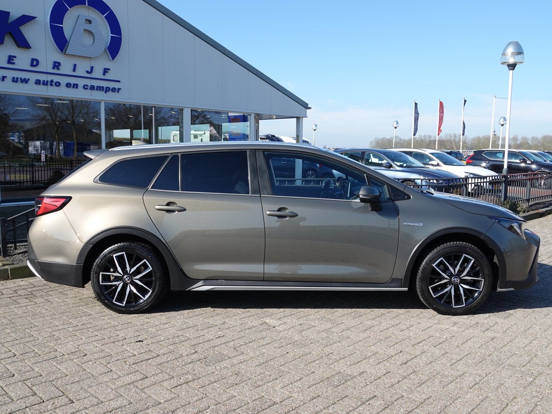 Toyota Corolla Touring Sports 2.0 Hybrid Trek ADAPT. CRUISE, 1345 kg, Gebruikt, 4 cilinders, Bruin