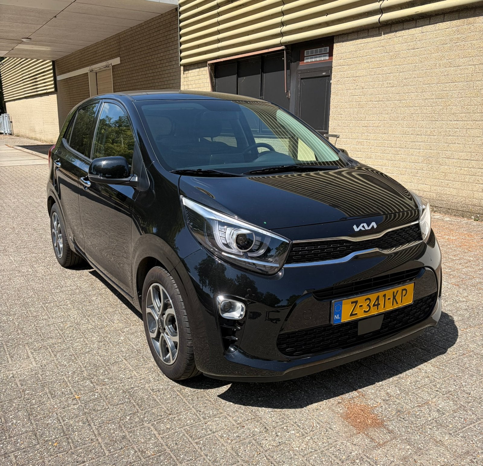 Kia Picanto 1.0 DPi AMT 67pk 4-zits 2024 Zwart. Als nieuw., Auto's, Voorwielaandrijving, 31 €/maand, 4 stoelen, Zwart