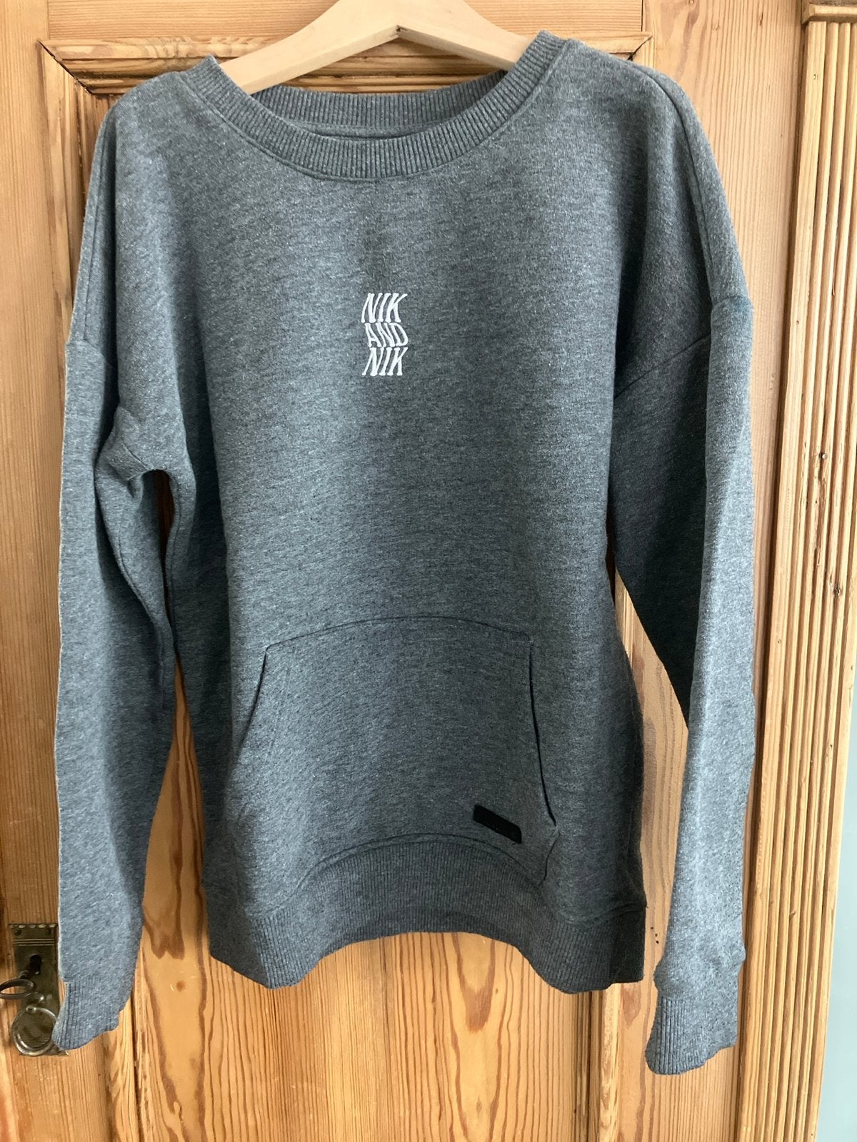 NIK & NIK by Nikkie sweater grijs maat 10/140, Ophalen of Verzenden, Zo goed als nieuw, Jongen of Meisje, Trui of Vest