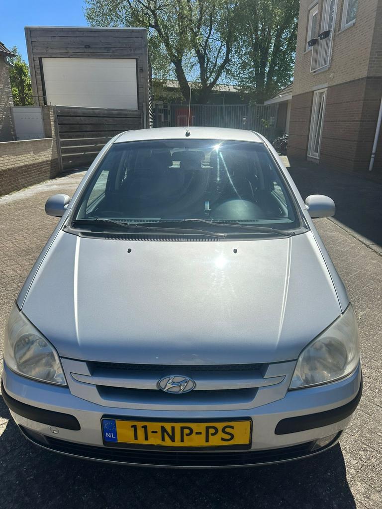 Te koop: Hyundai Getz 1.3 5DRS AUT 2004 Grijs, Auto's, 40 €/maand, 4 cilinders, Origineel Nederlands, Grijs