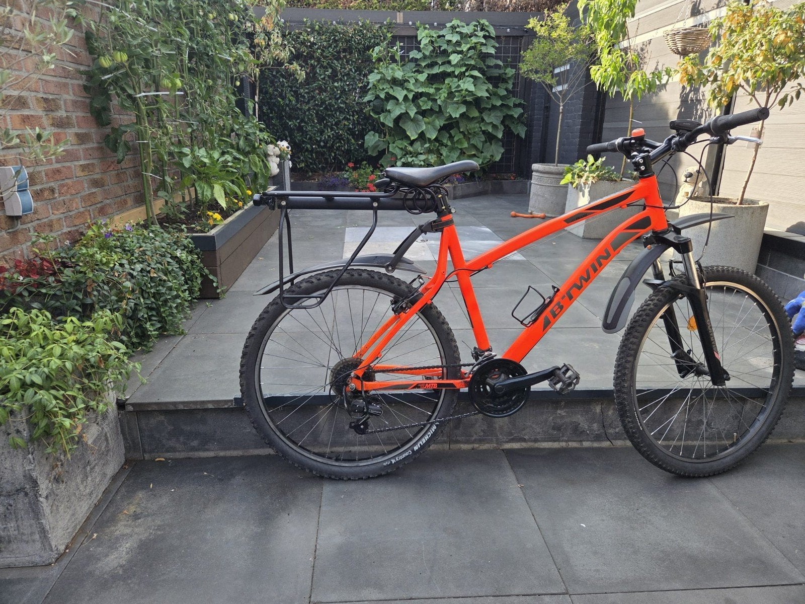 B'Twin Mountainbike Oranje met Bagagedrager, Fietsen en Brommers, Ophalen, Zo goed als nieuw, Overige merken