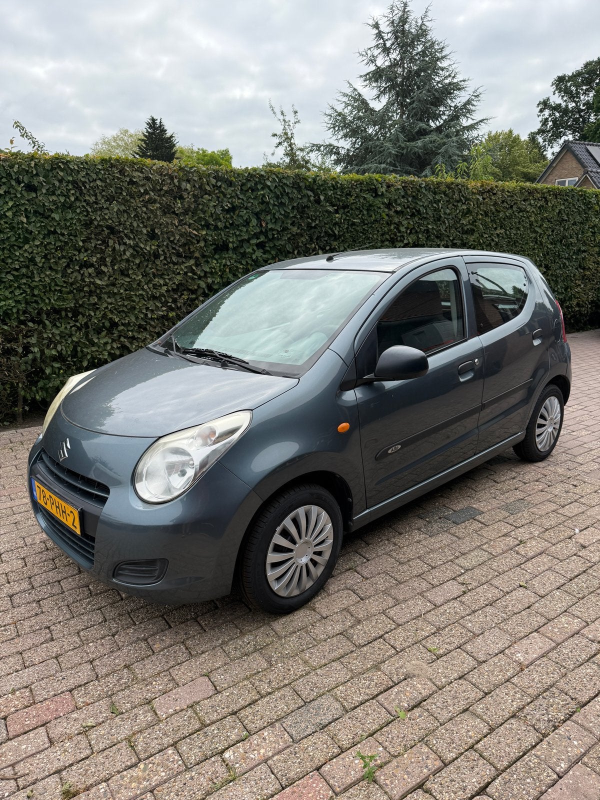 Suzuki Alto 1.0 2011 Grijs, Auto's, Voorwielaandrijving, 200 kg, 4 stoelen, Origineel Nederlands