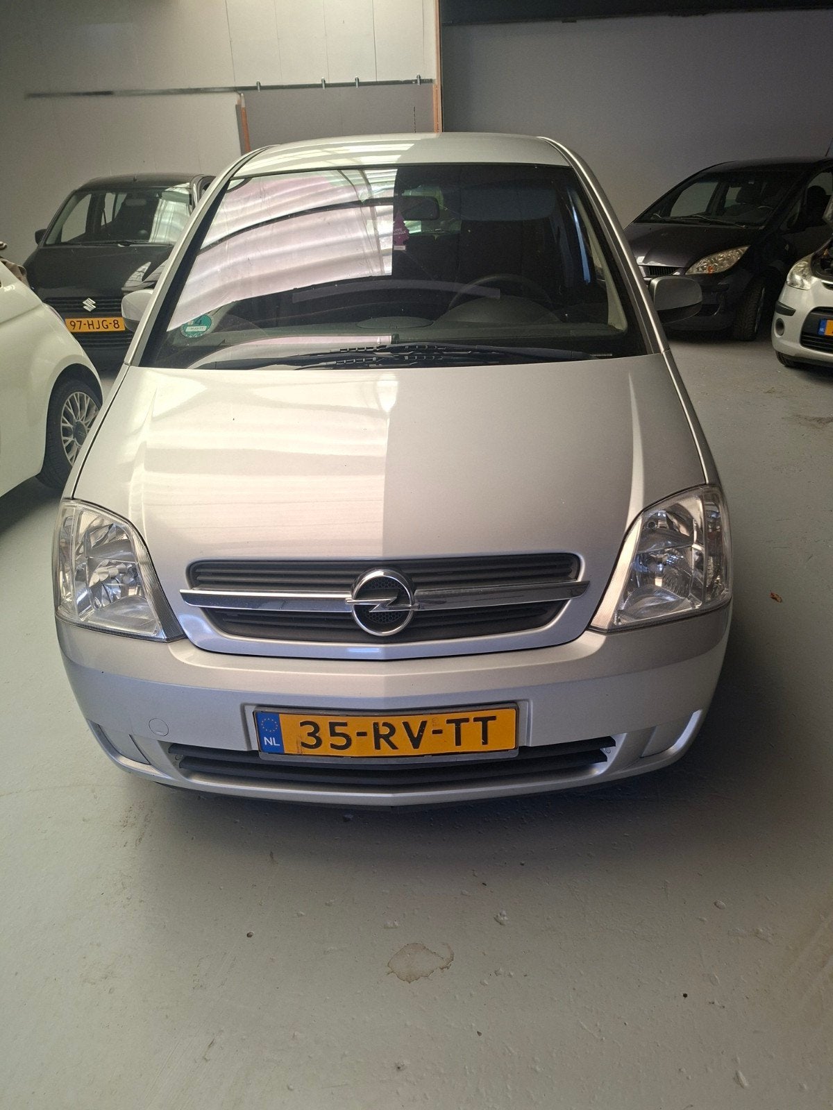 Opel Meriva 1.6 16V Easytronic 2005 Grijs, Auto's, Stof, Zwart, 4 cilinders, 100 pk