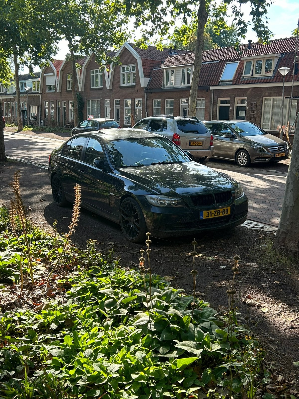 BMW 3-Serie 2.0 I 318 2006 Zwart, Auto's, Achterwielaandrijving, Beige, 4 cilinders, 129 pk