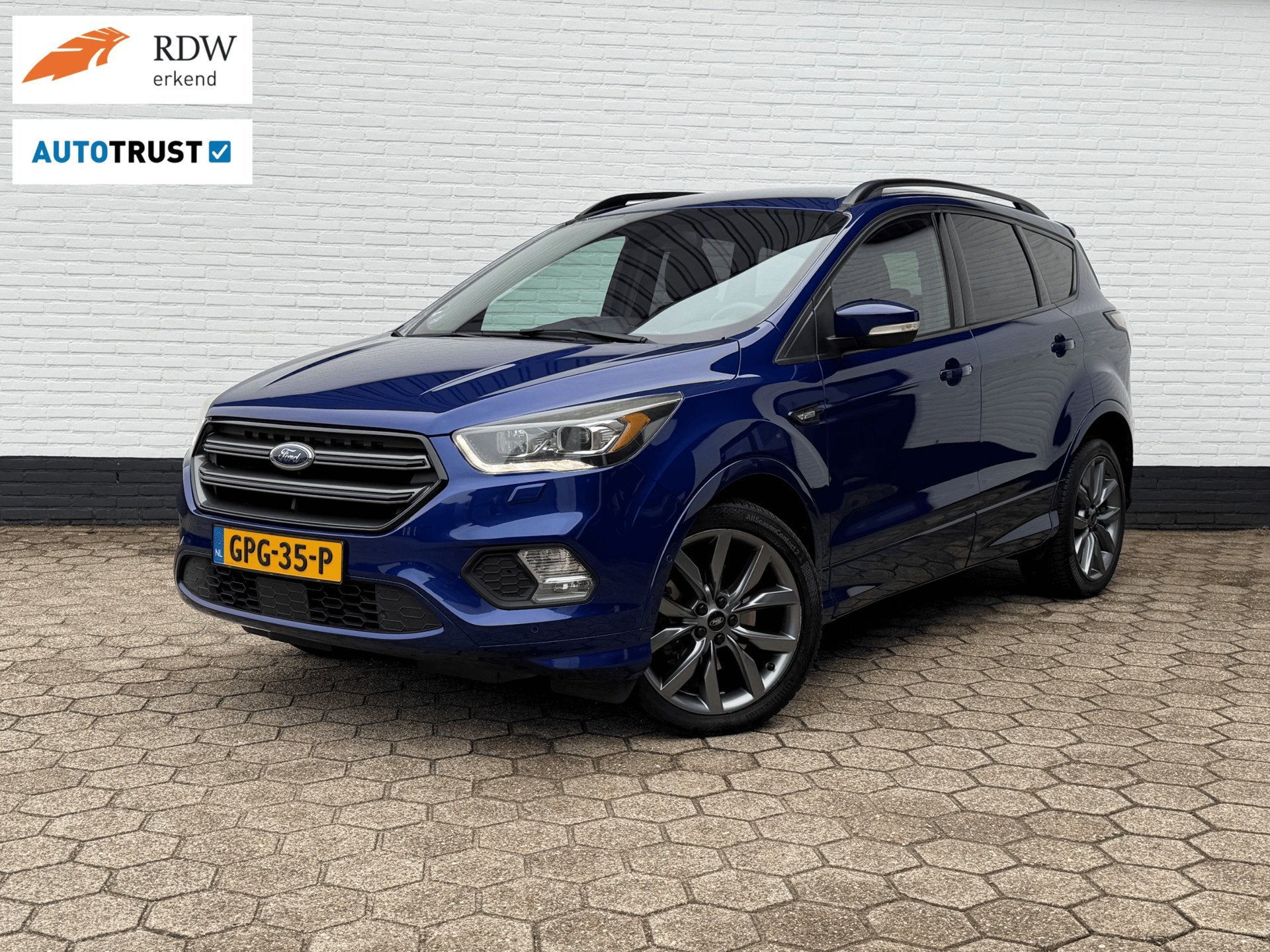 Ford KUGA 1.5 ST-Line 4WD 182PK AUTOMAAT l TREKHAAK l CAMERA, Auto's, Automaat, 4 cilinders, 1850 kg, Blauw