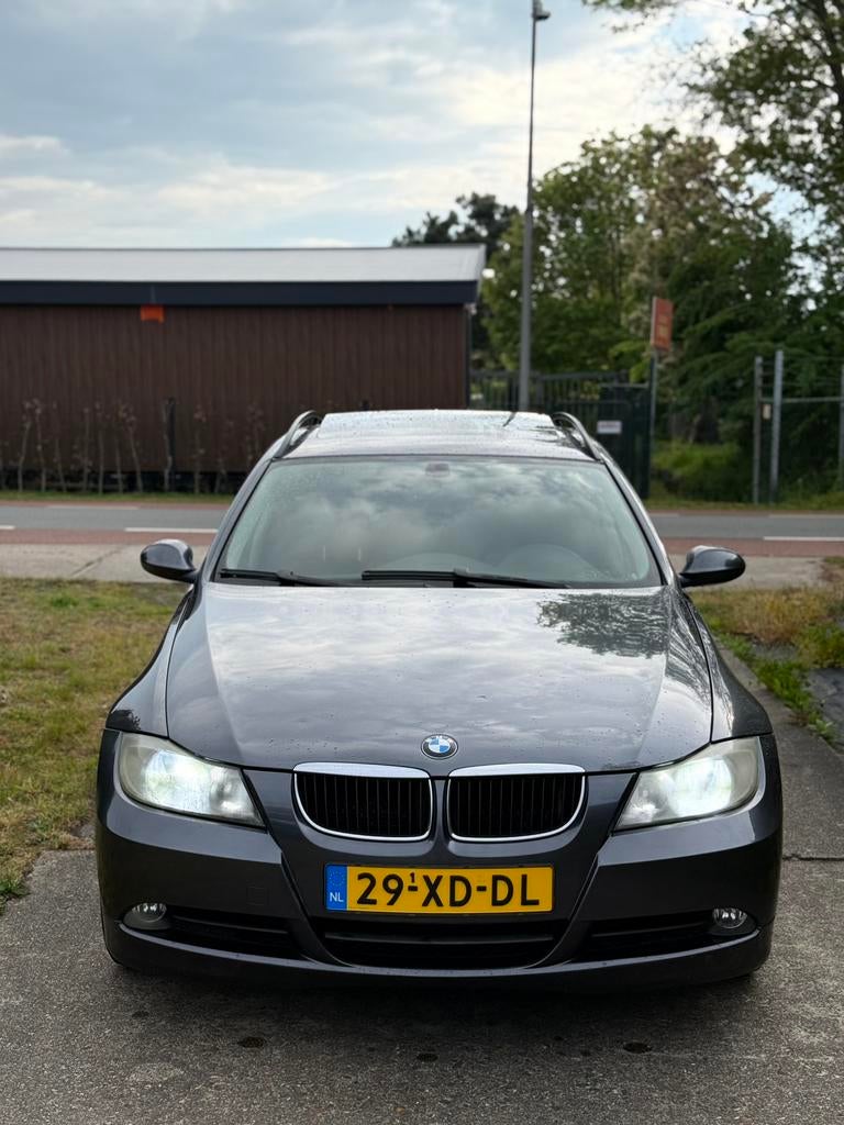 BMW 320i Touring E91 automaat uit 2005 met panorama dak, Automaat, Zwart, Panoramadak, Leder