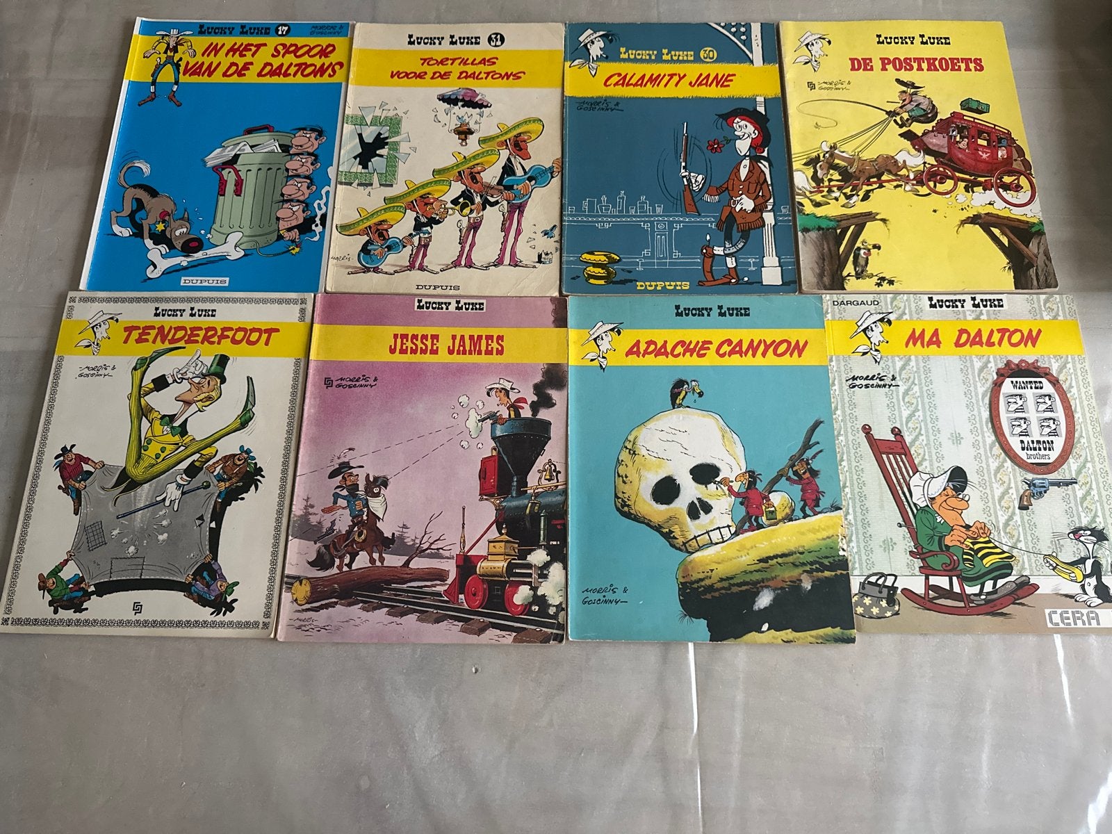Lucky Luke stripboeken - 8 delen, Meerdere stripboeken, Ophalen of Verzenden, Gelezen