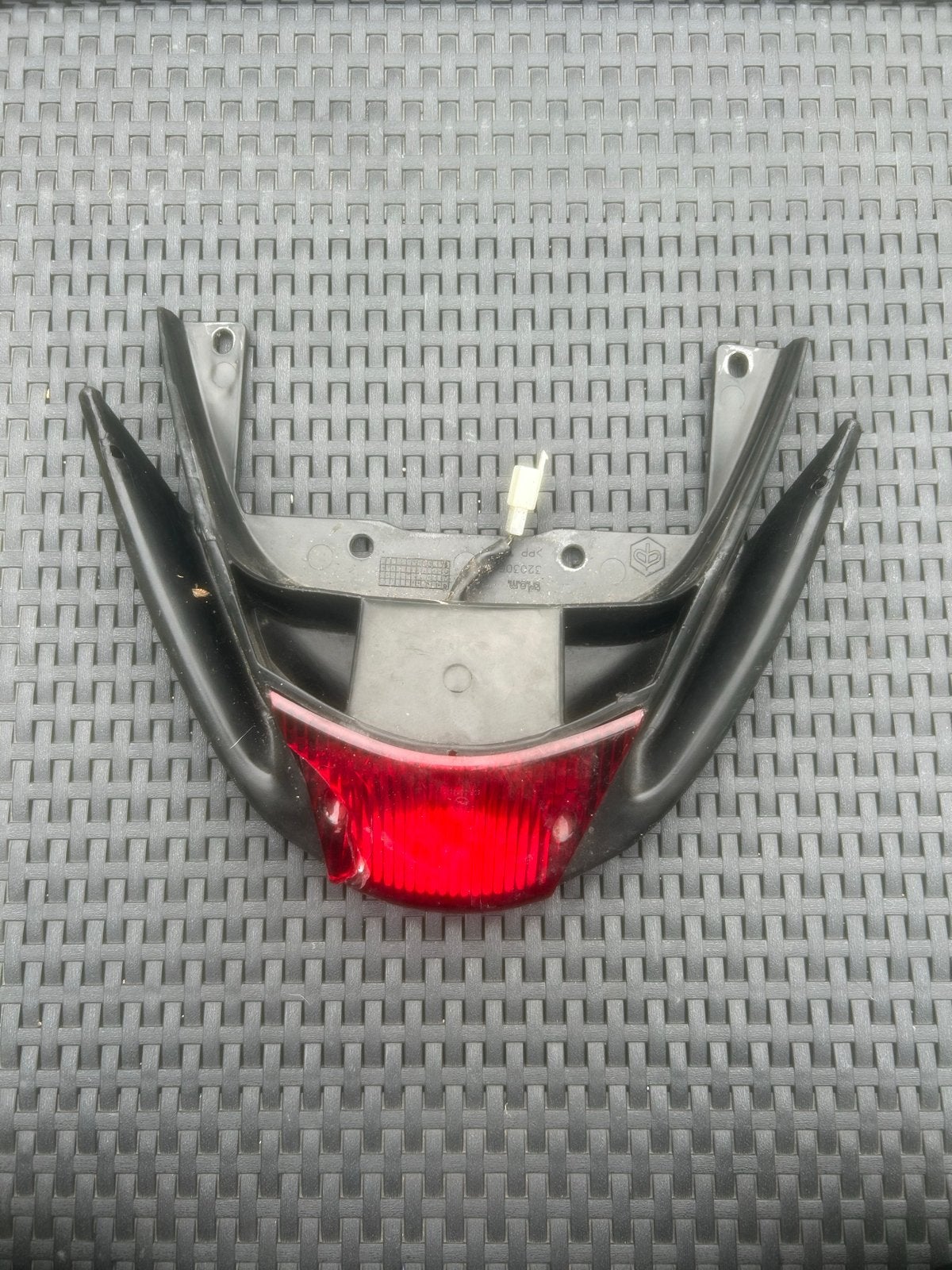 Sp Achterlicht unit Piaggio Zip met achterlicht, Fietsen en Brommers, Ophalen of Verzenden, Gebruikt, Koplamp, Piaggio