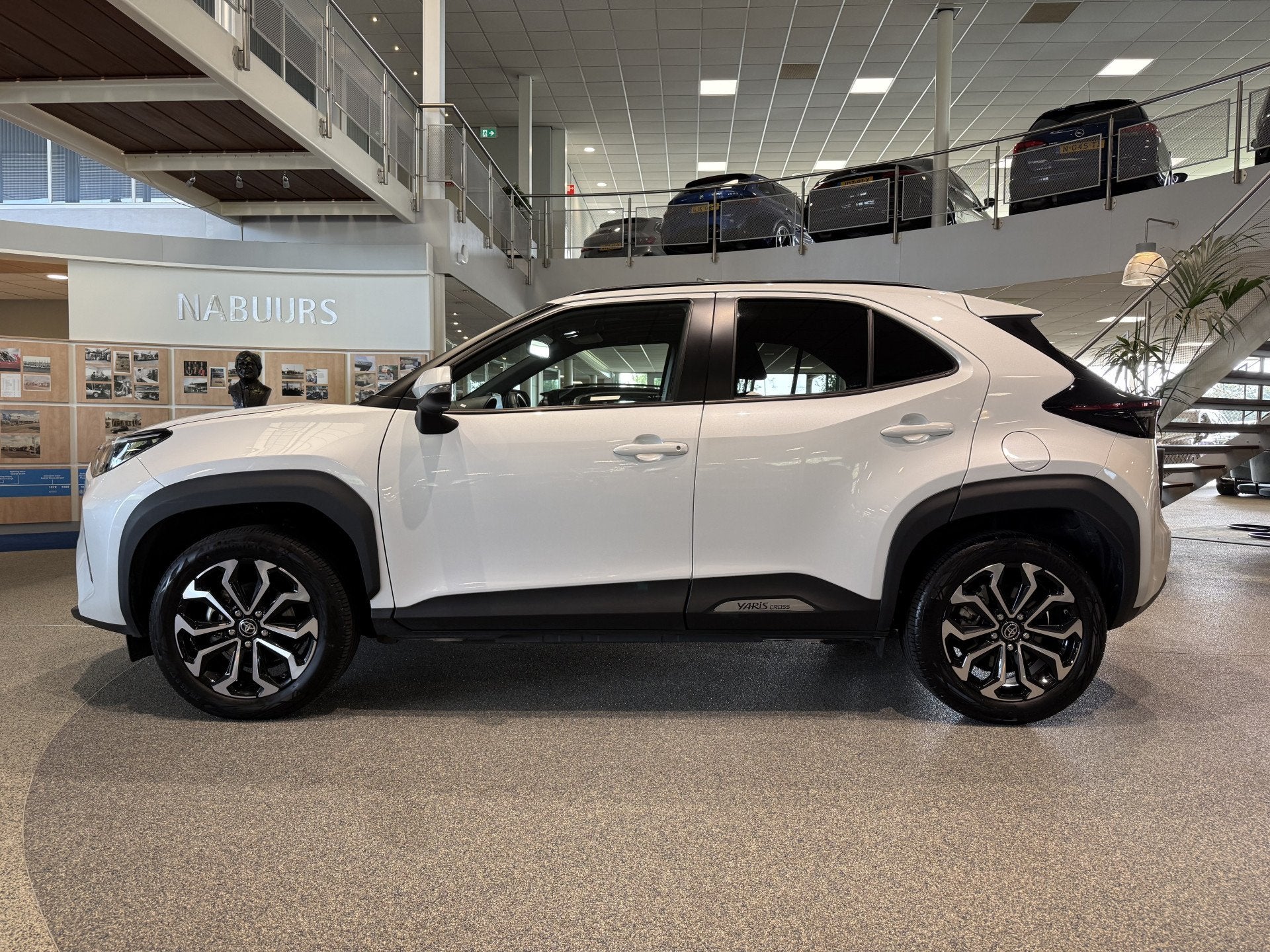 Toyota Yaris Cross 1.5 Hybrid Explore NL auto, Pano, Trekhaa, 12 maanden, Stof, Gebruikt, 116 pk
