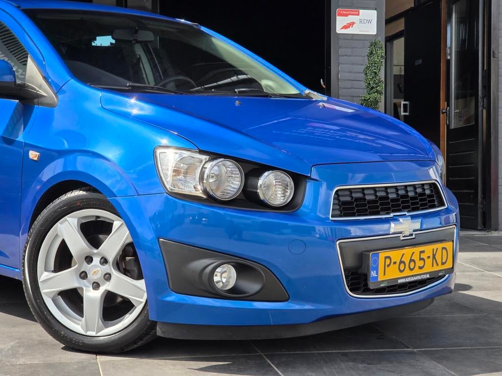 Chevrolet Aveo 1.6|Airco|Cruise Control|PDC|Trekhaak|APK, Voorwielaandrijving, Euro 5, Gebruikt, 4 cilinders