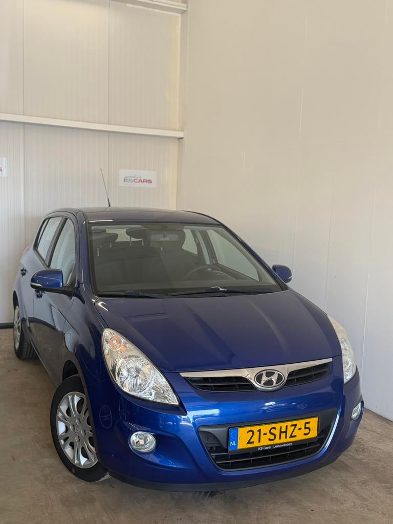 Hyundai i20 1.2i i-Motion Dealer onderhouden Eerste Eigenaar, Auto's, 450 kg, 31 €/maand, 4 cilinders, Blauw