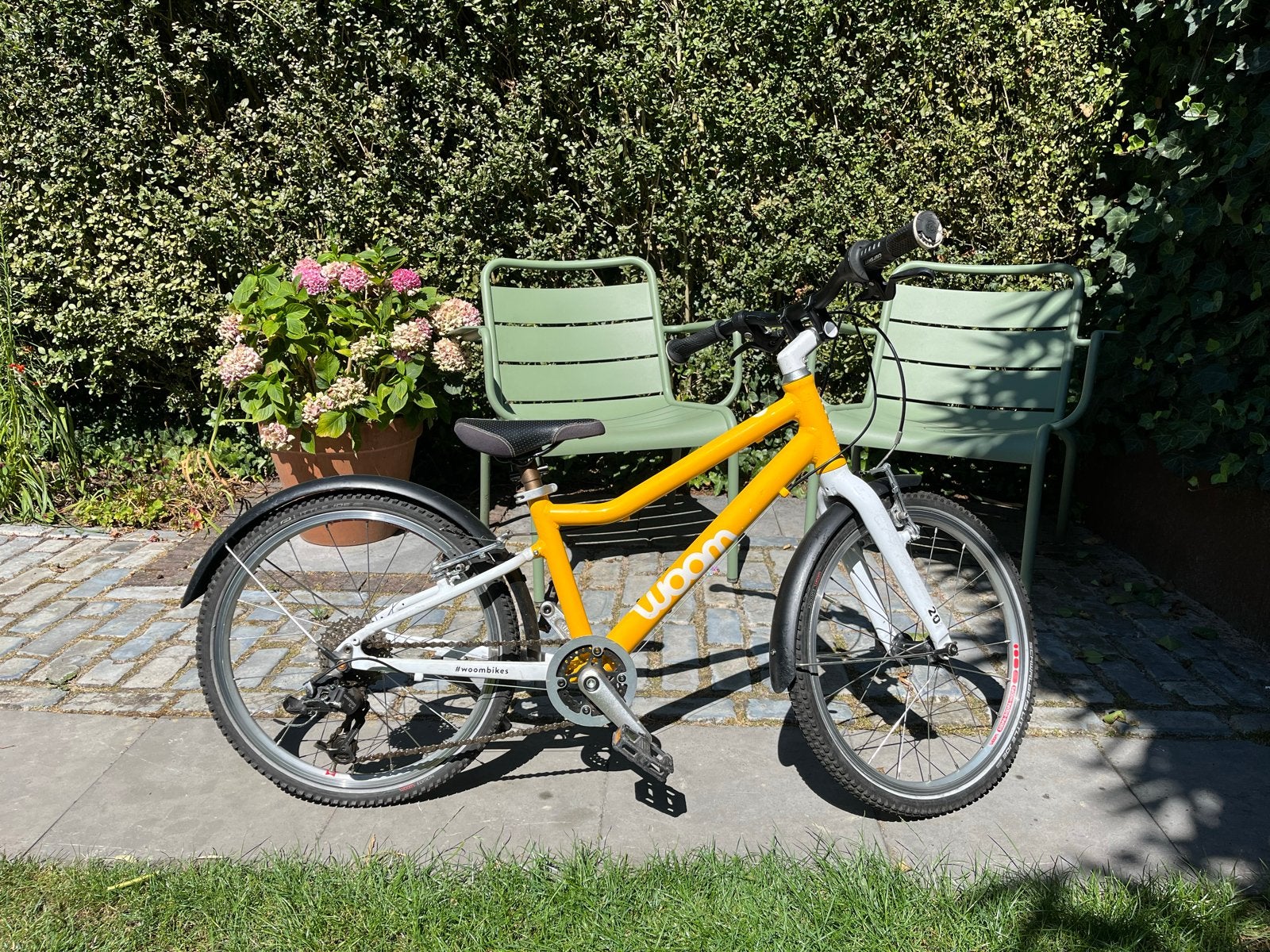 Woom 4 kinderfiets geel - 20 inch, Fietsen en Brommers, Fietsen | Kinderfietsjes, Ophalen, Gebruikt, Velgrem, 20 inch of meer