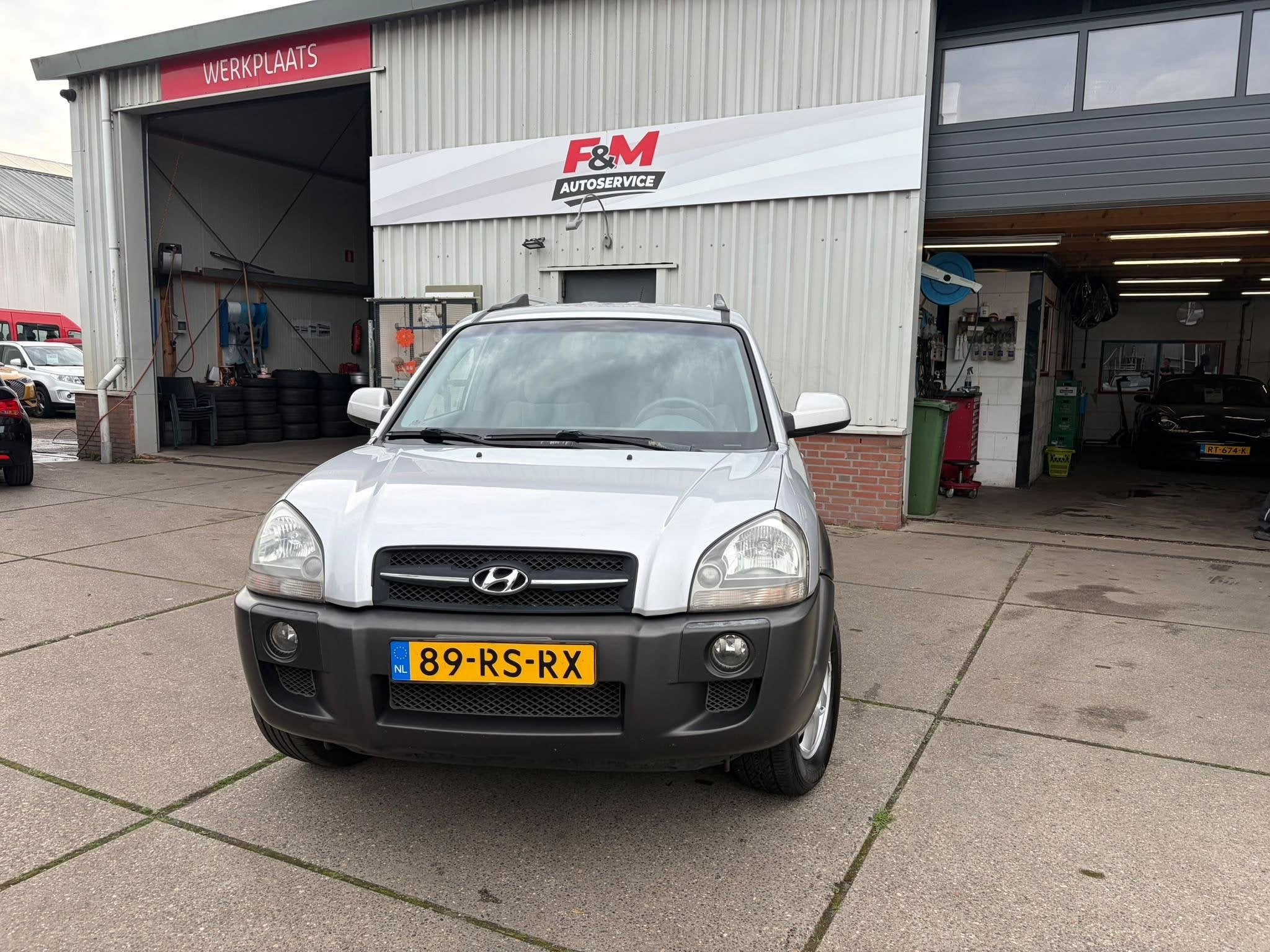 Hyundai Tucson 2.0i Style Clima, cruise, radio, trekhaak, Auto's, Stof, Gebruikt, 4 cilinders, Handgeschakeld