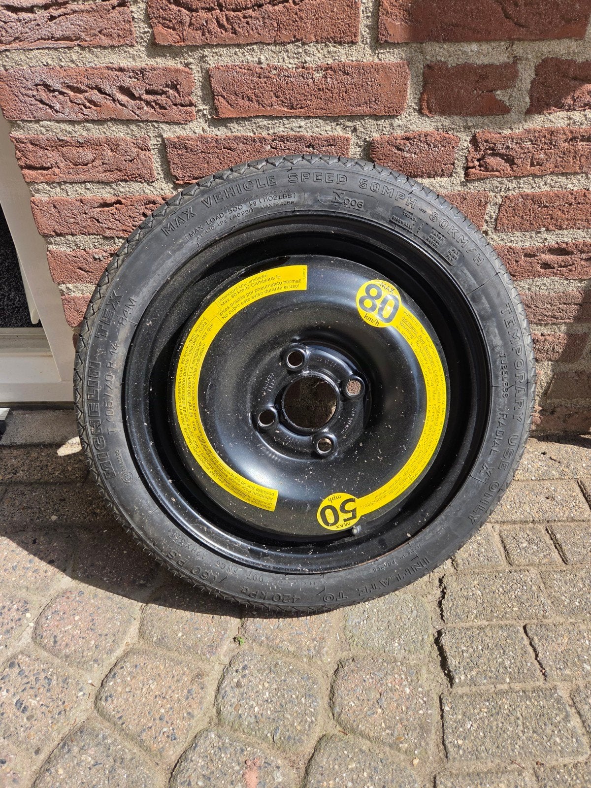 Thuiskomer / Noodreservewiel – T105/70 R14, Ophalen