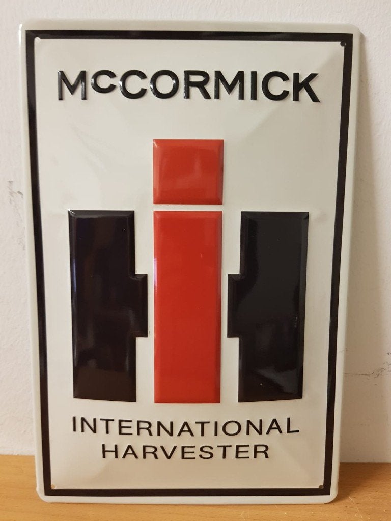 Mc Cormick International Harvester relief metalen wandbord