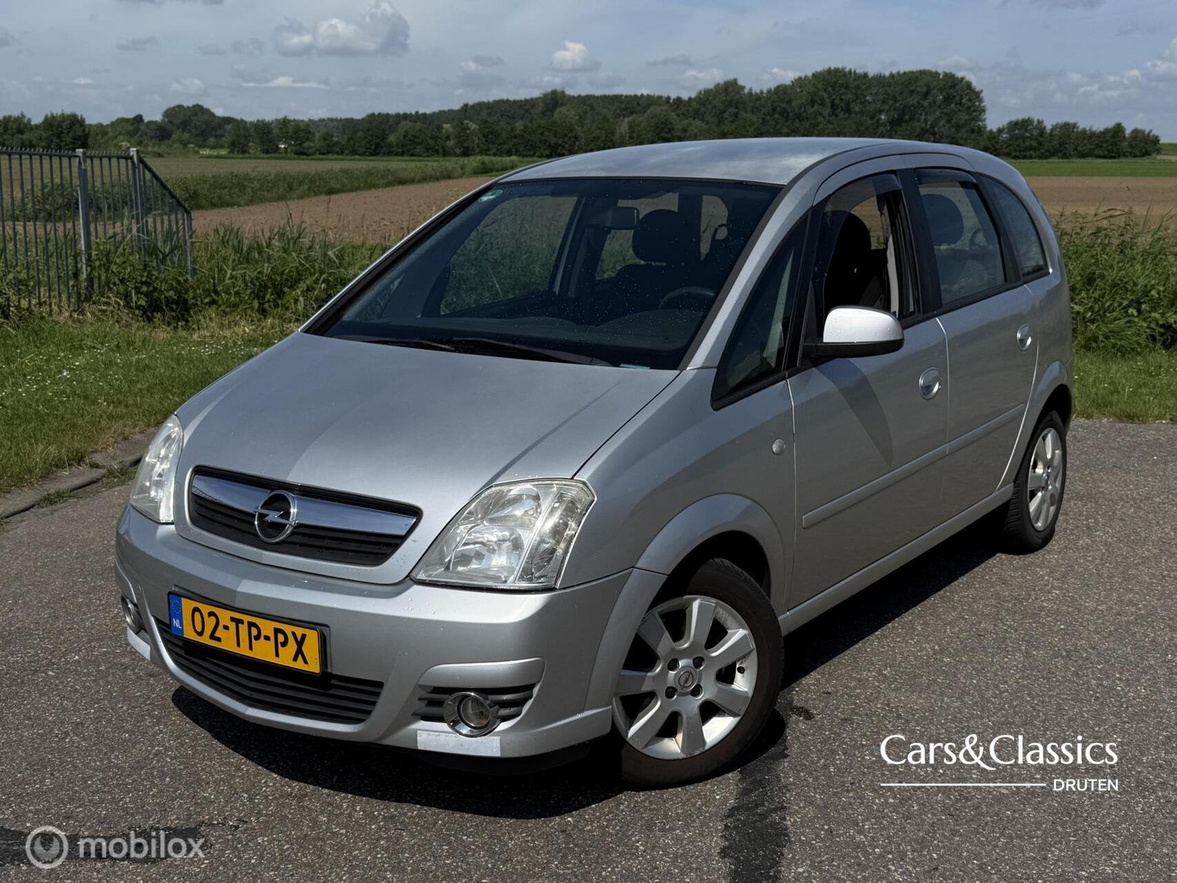 Opel Meriva 1.6-16V Cosmo | AIRCO | APK 03-2027 | TREKHAAK, Auto's, Voorwielaandrijving, Gebruikt, Zwart, 4 cilinders