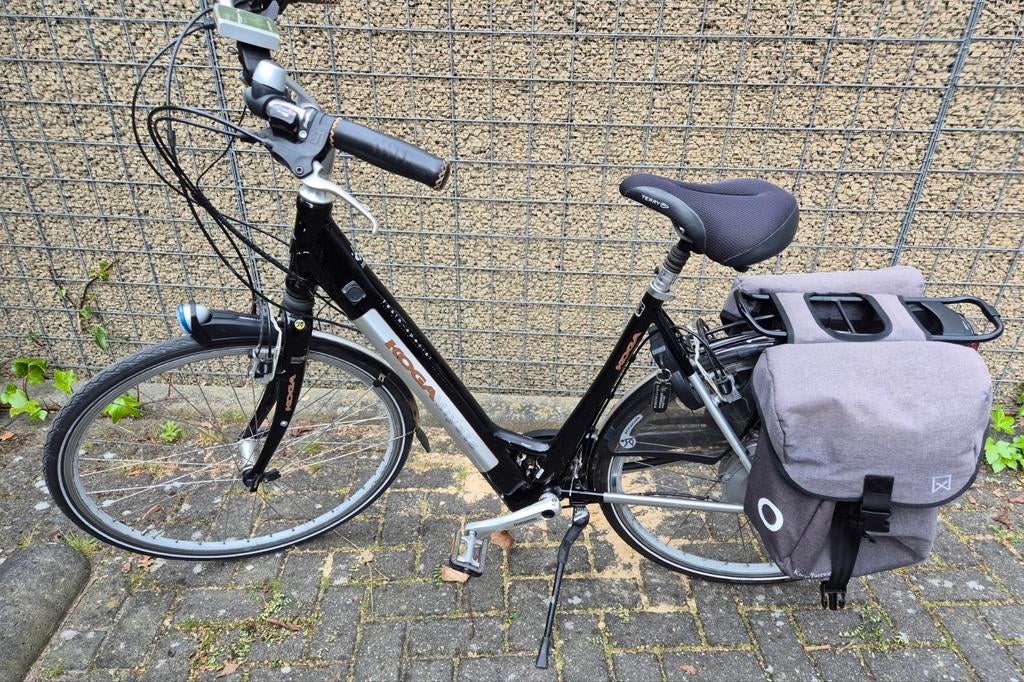 Koga Miyata Tesla Special E-bike met fietstassen, Gebruikt, 51 tot 55 cm, 30 tot 50 km per accu, Ophalen