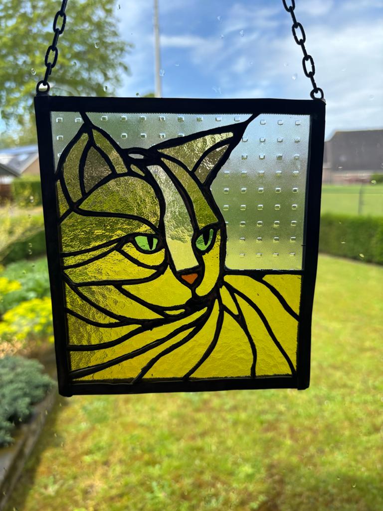 Tiffany glas in lood kat, Ophalen