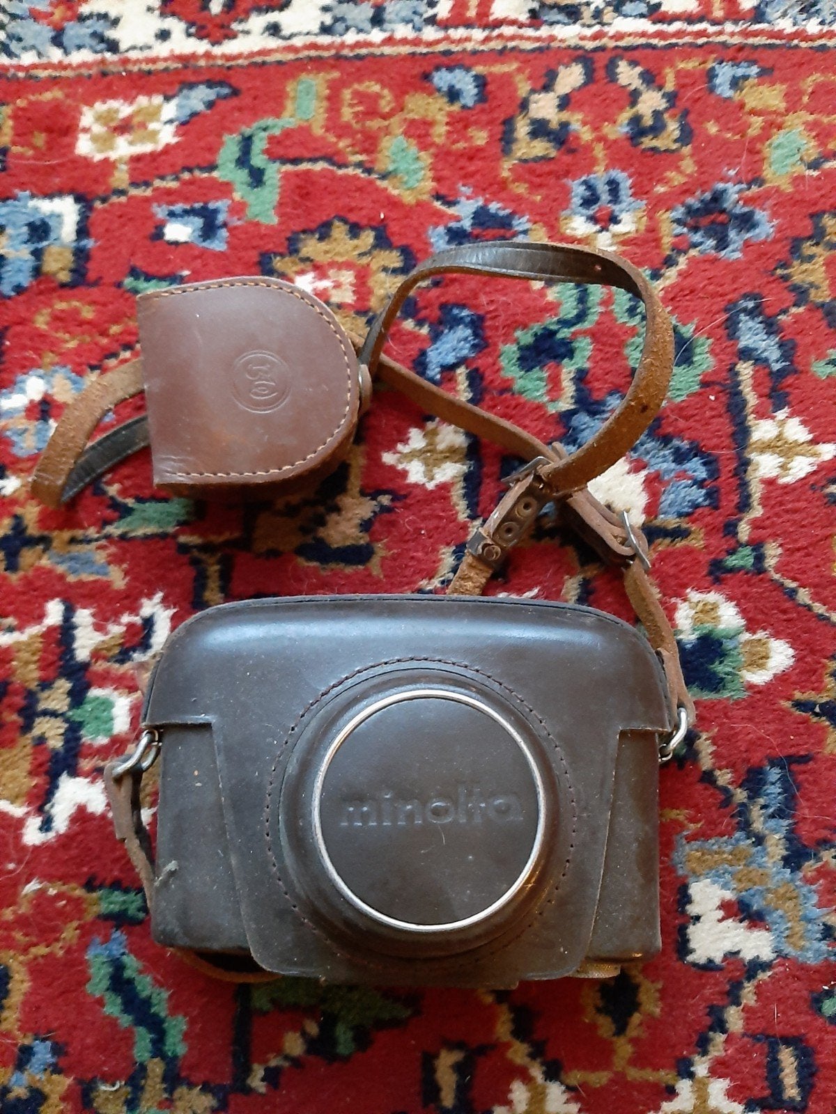 Vintage Minolta A5 camera met originele leren tas, Ophalen of Verzenden