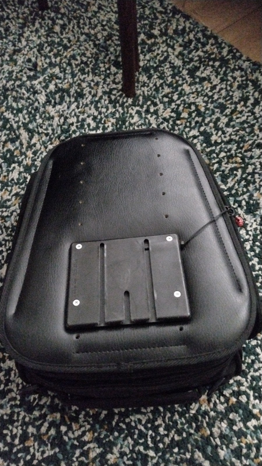 Joker tanktas voor motorfiets, Ophalen