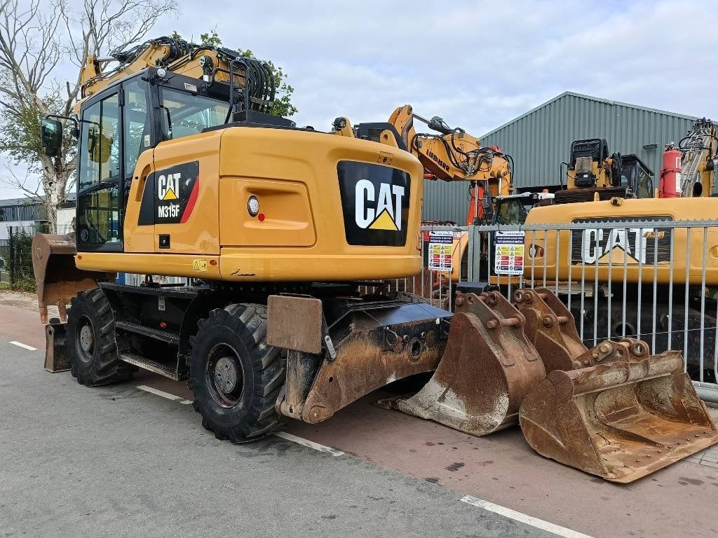 Cat M 315 F mobiele graafmachine excavator bagger (bj 2017), Graafmachine