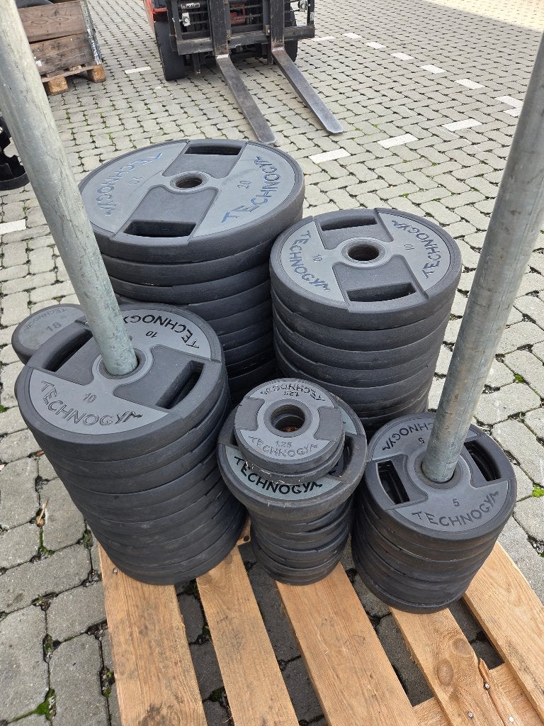 Technogym PU Urethane halterschijven - diverse gewichten, Sport en Fitness, Ophalen, Gebruikt, Benen, Halterschijven