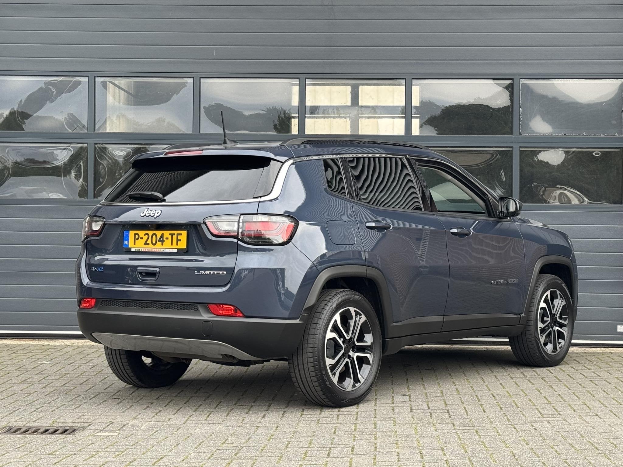 JEEP COMPASS 4xe 240 PLUG-IN HYBRID ELECTRIC LIMITED I WINTE, Auto's, Automaat, 4 cilinders, Met garantie (alle), Blauw