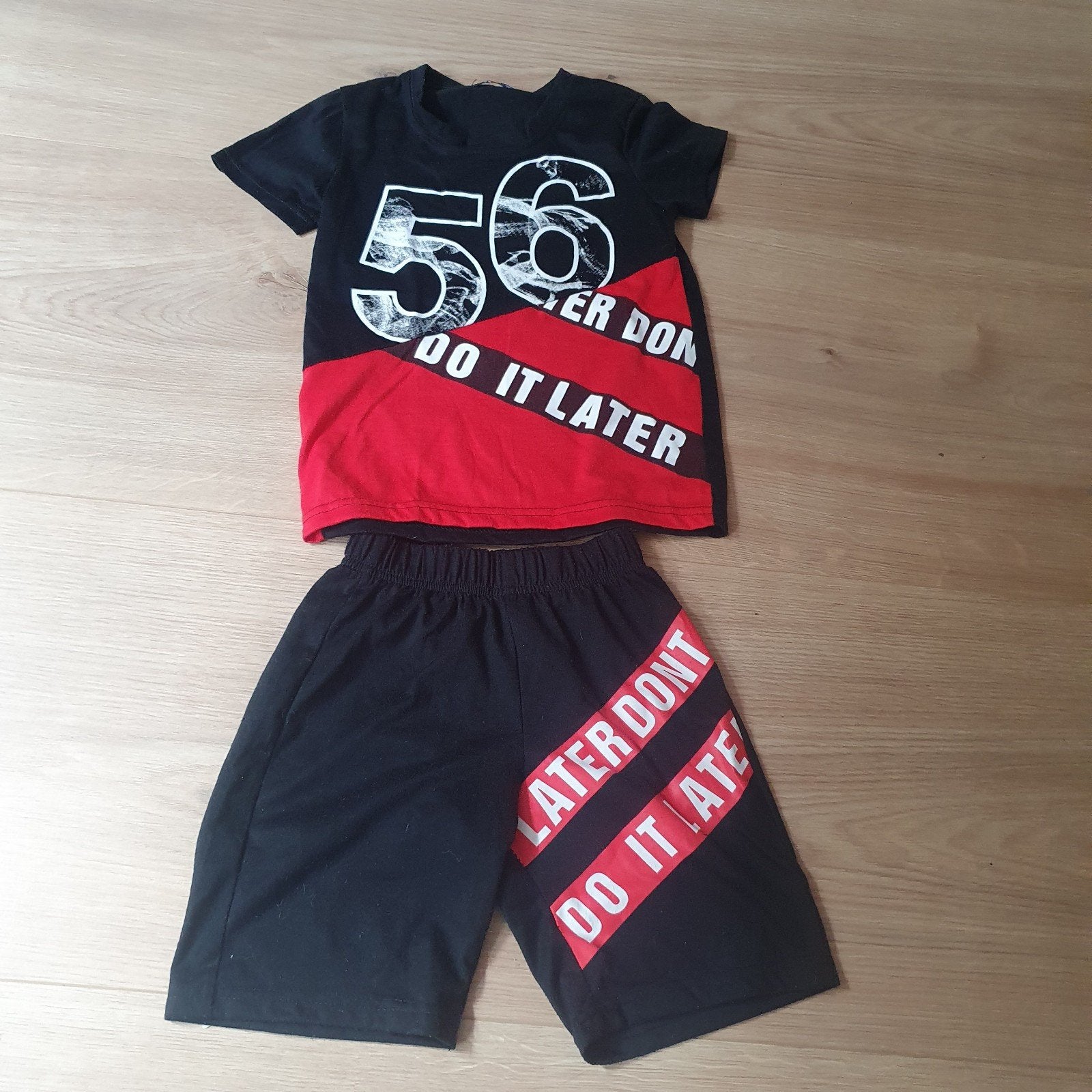 Zwart sportsetje voor kinderen - T-shirt en korte broek, Ophalen of Verzenden, Gebruikt