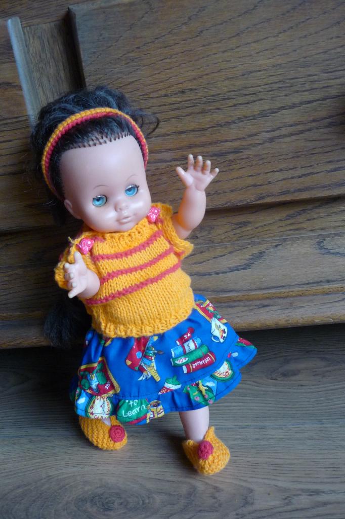 Plastic Pop (ongeveer 35 cm) met kleertjes., Ophalen of Verzenden, Gebruikt, Babypop