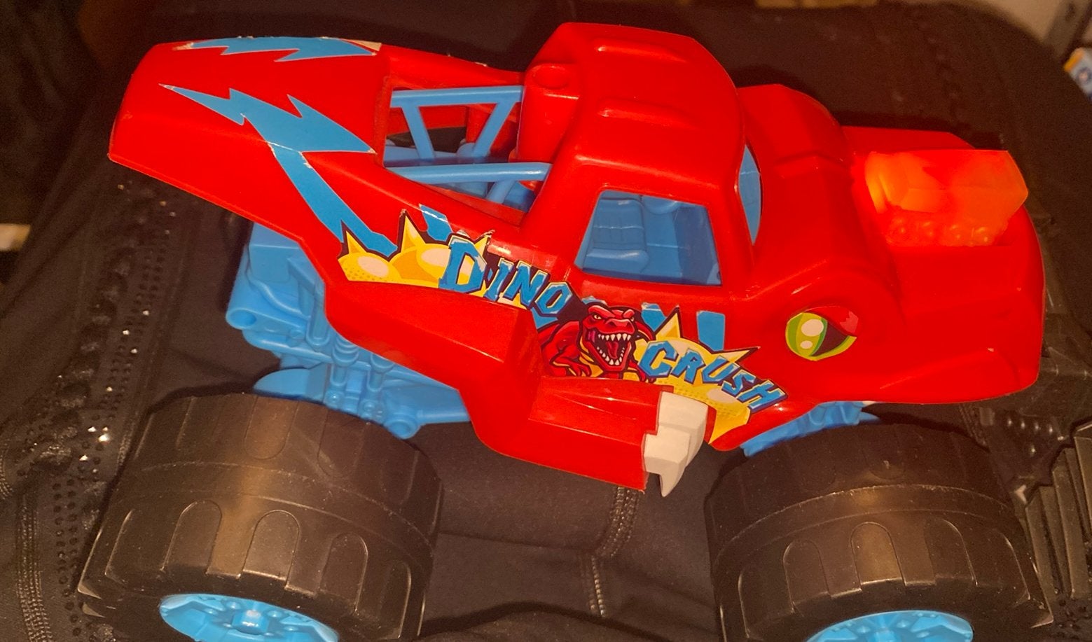 Monstertruck dino met geluid, Ophalen