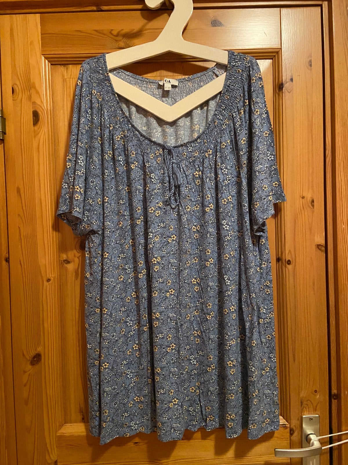 Top lichtblauw bloempje C&A 52/54 oto 66 lengte 83, Ophalen of Verzenden, Zo goed als nieuw, Blauw, Shirt of Top