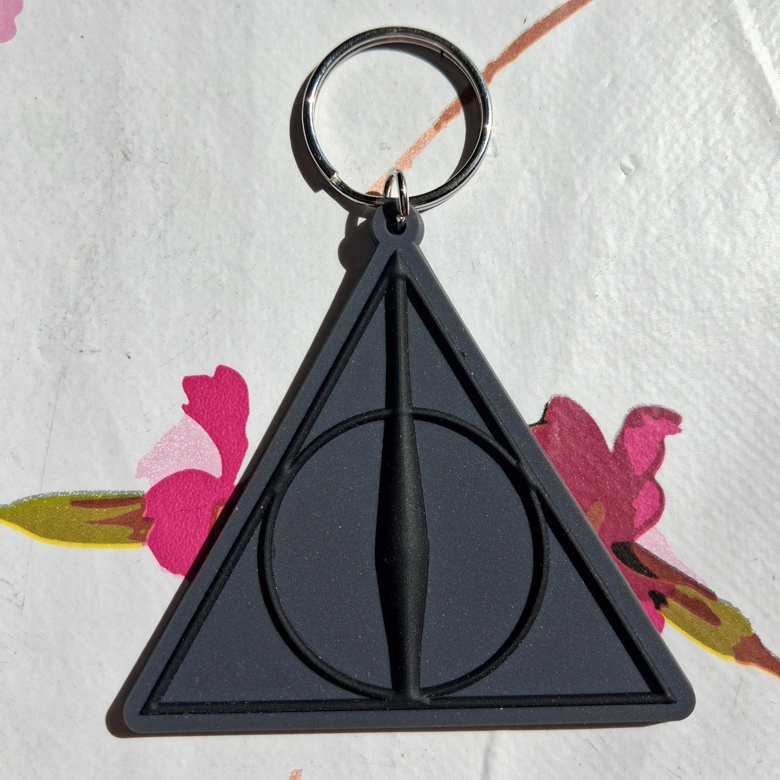 Harry Potter Deathly Hallows rubberen sleutelhanger, Verzamelen, Harry Potter, Ophalen of Verzenden, Zo goed als nieuw, Overige typen
