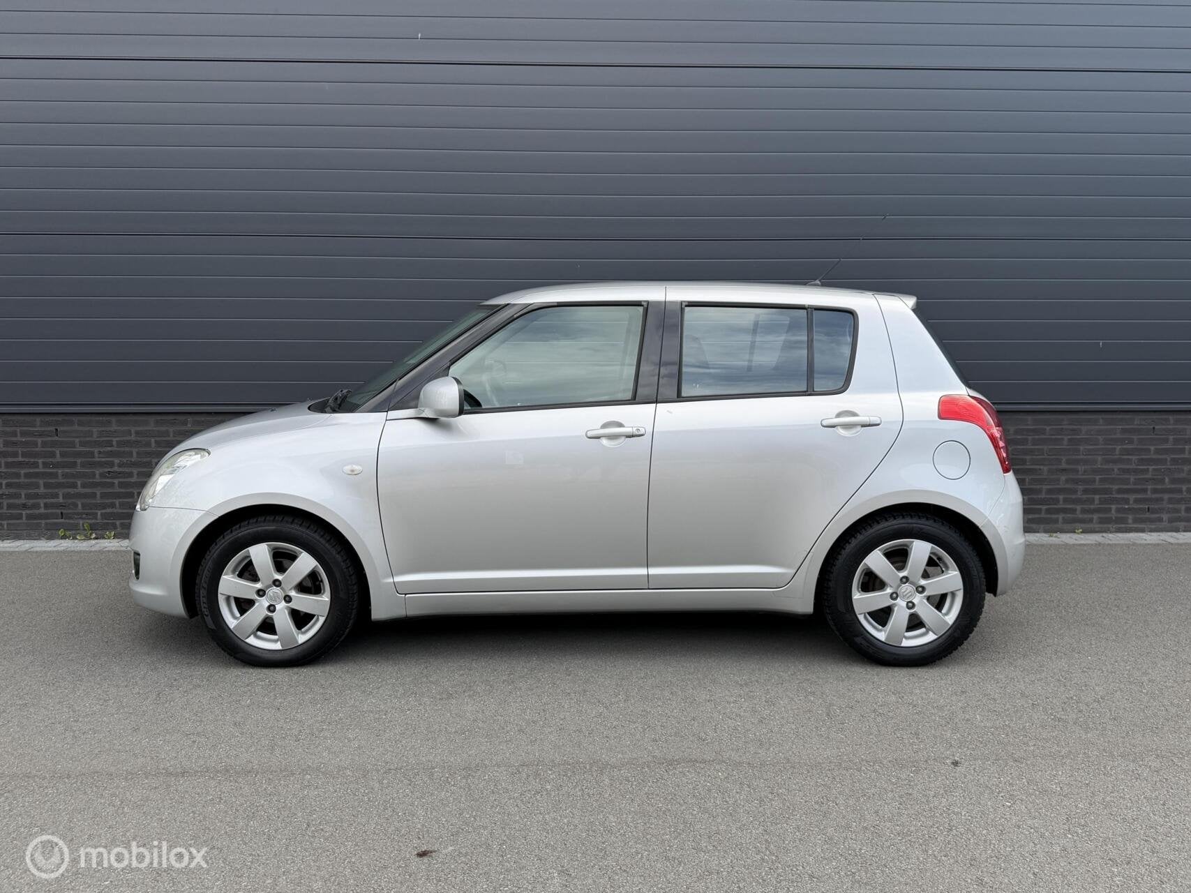 Suzuki Swift 1.3 Shogun 128.000KM NAP! AIRCO*CV*LM*ELECTRR, Auto's, Voorwielaandrijving, Huisgarantie, Met garantie (alle), 400 kg